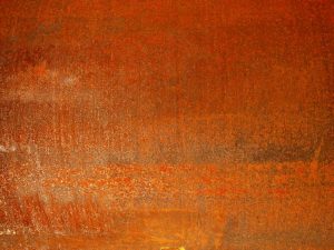 A corten steel surface texture at the start of the weathering process