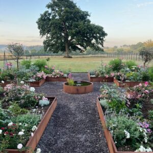 Corten steel raised beds with Circular water feature