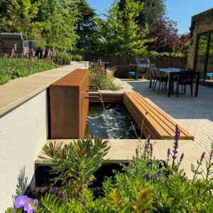 Corten water wall with 3 spouts