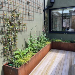 Corten steel trough planter in courtyard 9