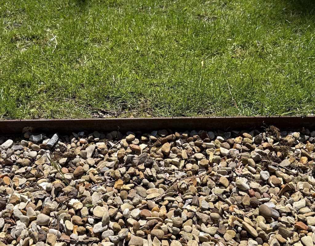 Steel edging with gravel 2 Corten steel garden edging with gravel