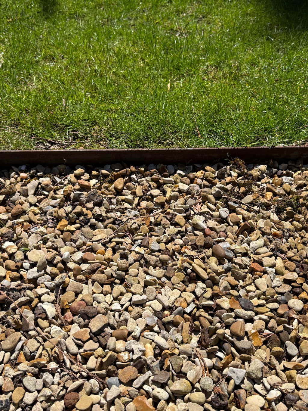 Corten steel garden edging with gravel